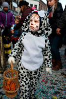 Binche festival carnival in Belgium Brussels. Children dressed like a rabbit. Music, dance, party and costumes in Binche Carnival. Ancient and representative cultural event of Wallonia, Belgium. The carnival of Binche is an event that takes place each year in the Belgian town of Binche during the Sunday, Monday, and Tuesday preceding Ash Wednesday. The carnival is the best known of several that take place in Belgium at the same time and has been proclaimed as a Masterpiece of the Oral and Intangible Heritage of Humanity listed by UNESCO. Its history dates back to approximately the 14th century.